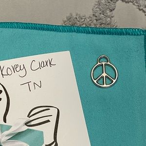 Authentic Tiffany & Co (retired) peace sign charm